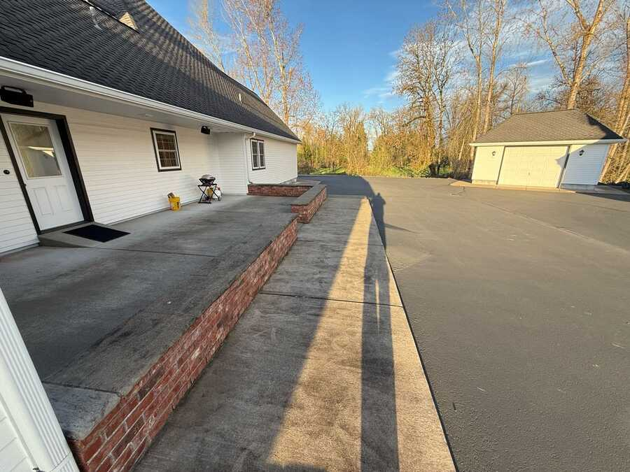 Clean concrete patio and driveway